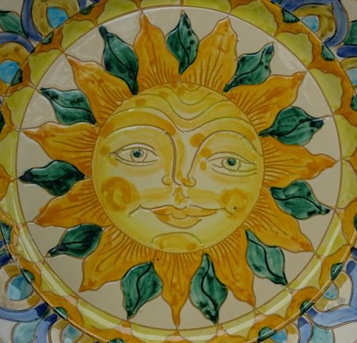 Sun Face On Antique Plate