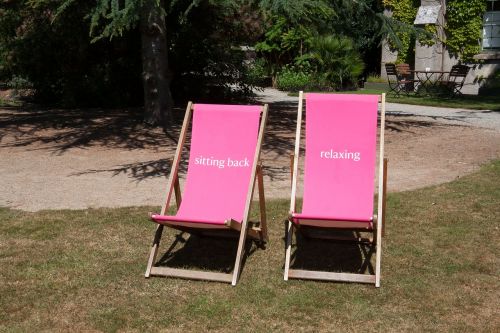 sun loungers pink wood