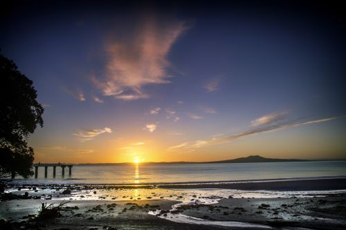 sun rise beach new zealand