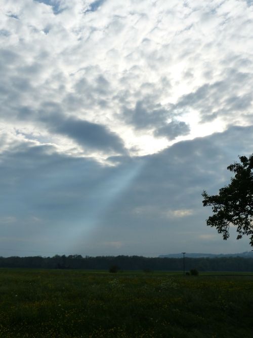 sunbeam clouds sky