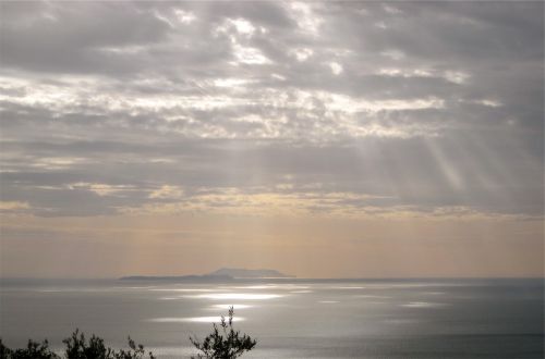 sunbeams clouds sky