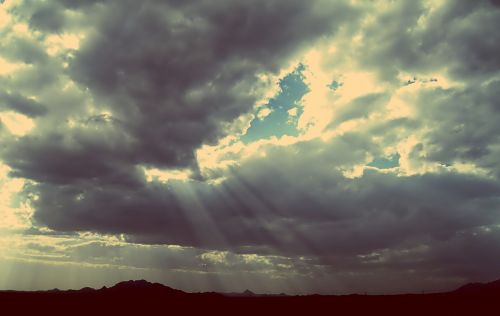 sunbeams sky clouds