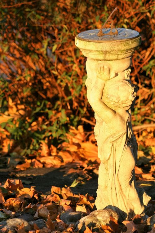 sundial garden statue