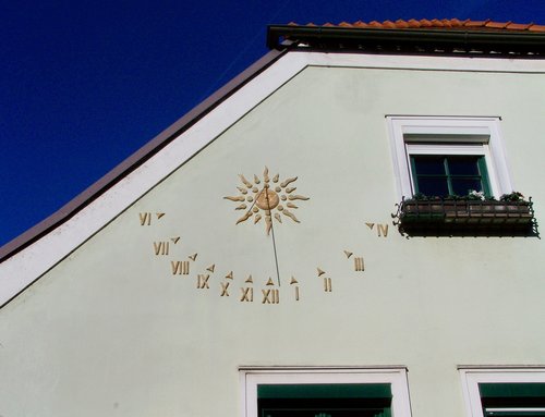 sundial  qualifying  façade ornaments