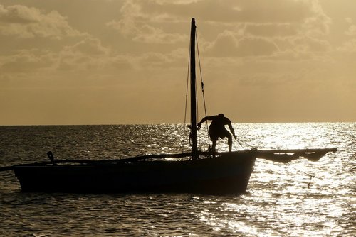 sundown  sea  boat