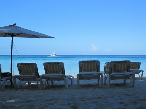 sunloungers beach sea