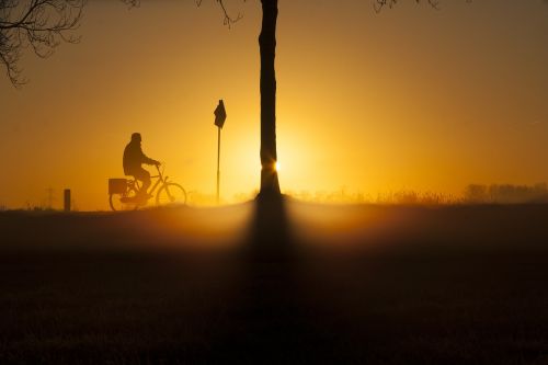 sunrise bicycle winter