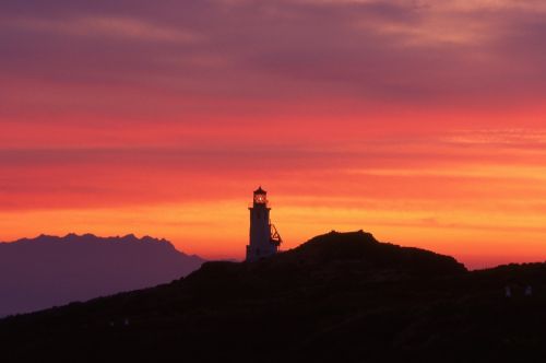 sunrise lighthouse dawn