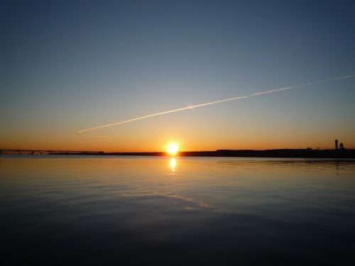 sunrise haneda offshore contrail