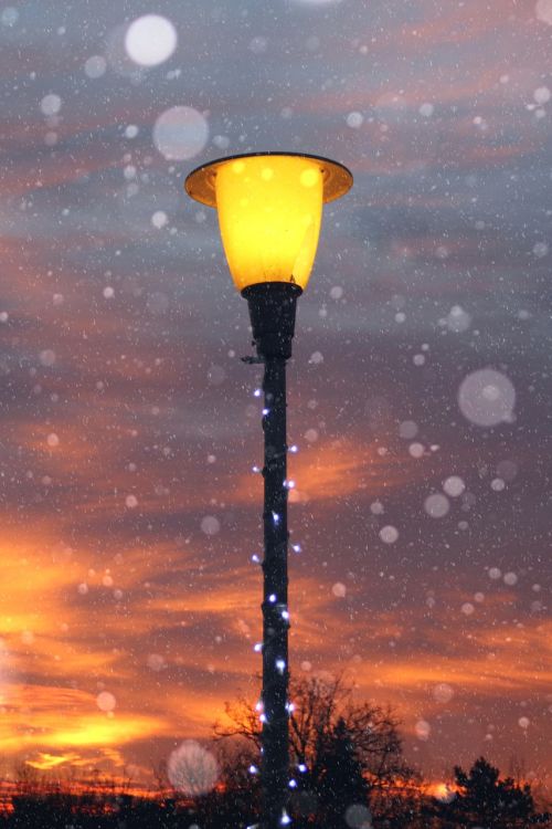 sunrise lantern snow