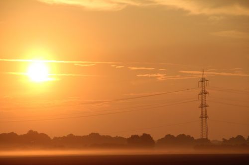 sunrise fog skies