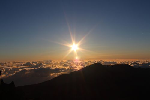 sunrise above the clouds sky