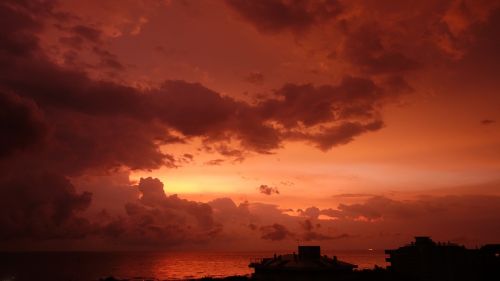 sunrise clouds sea