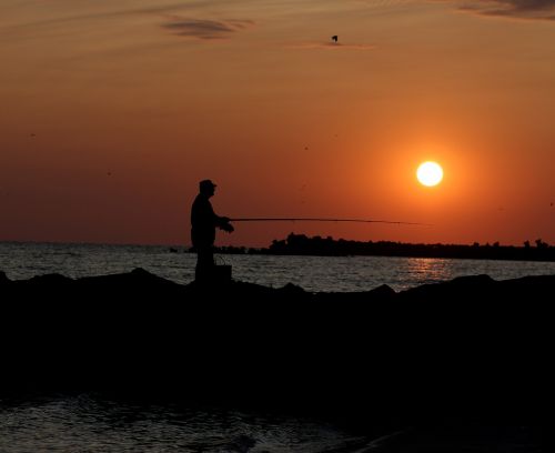 sunrise fisherman sun