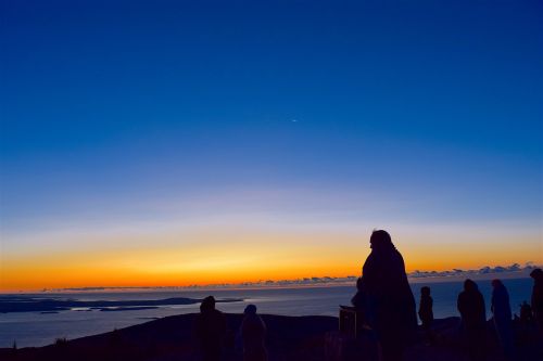 sunrise silhouette people