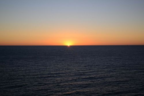 sunrise cloudless ocean