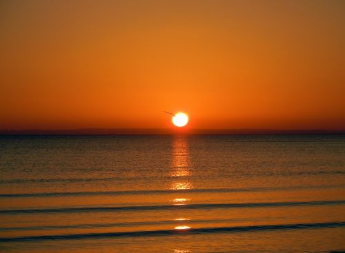 sunrise on the sea romantic mirroring