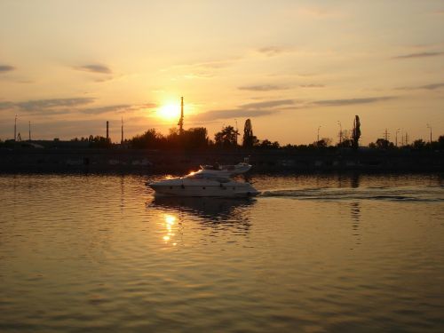 sunset boat ocean