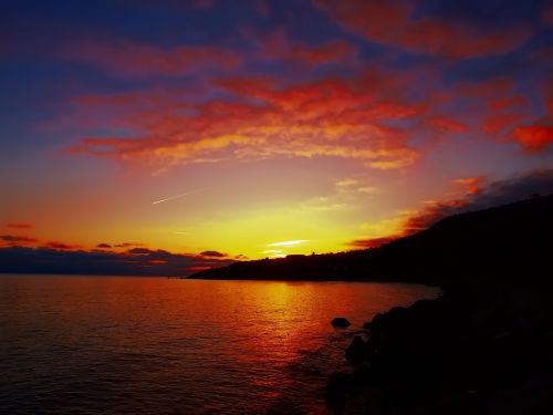 sunset airplanes ocean view