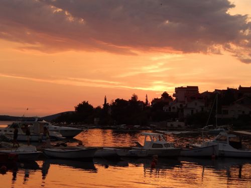 sunset boats sea