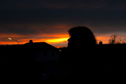 sunset woman silhouette