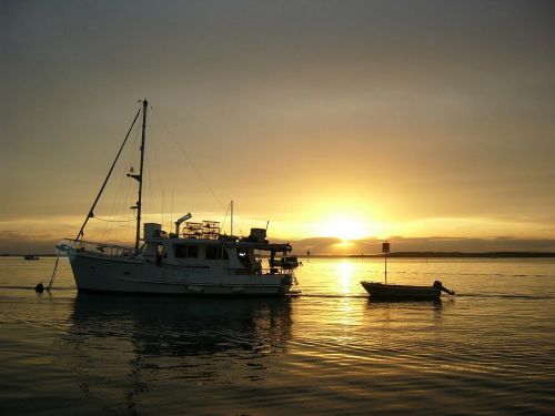 sunset boats sea