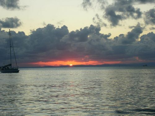 sunset ocean clouds at sea