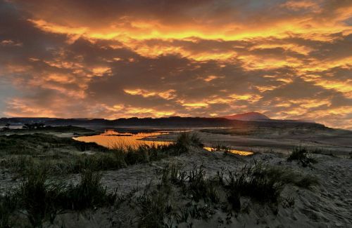 sunset yellow clouds beach