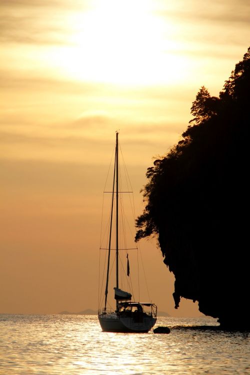sunset boot sailing boat
