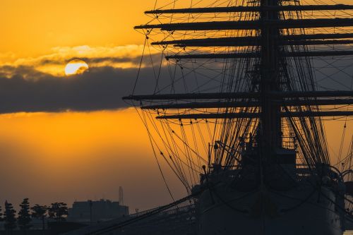 sunset sailing ship superstructure