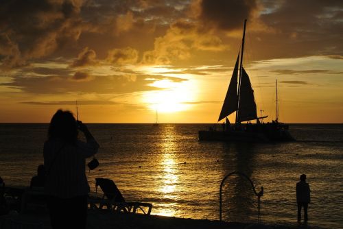 sunset beach sailing
