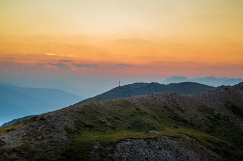 sunset mountains cross