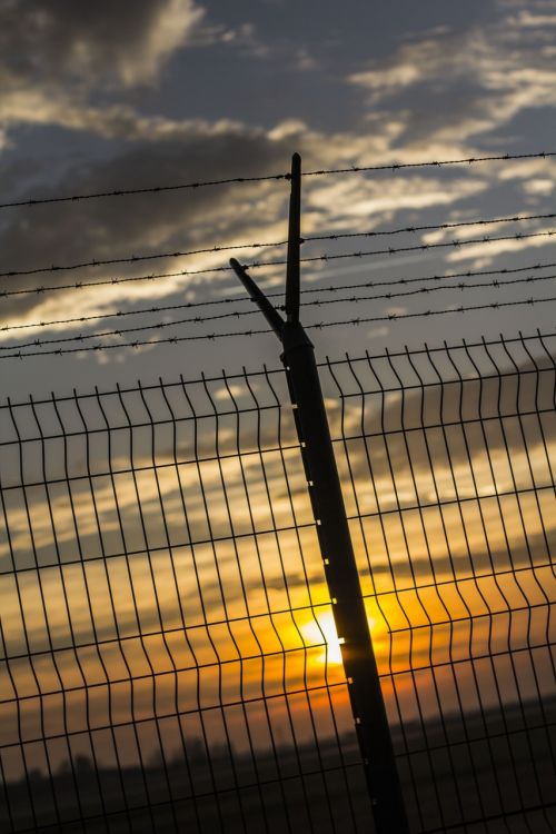 sunset fence sun