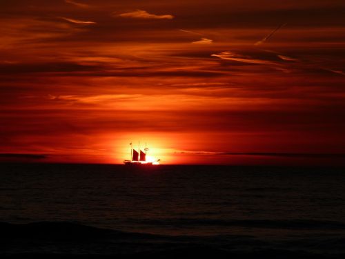 sunset sailing boat sea