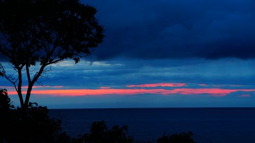 sunset ocean blue and pink clouds