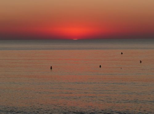 sunset sea clouds