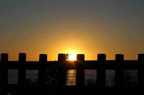 sunset gate sun