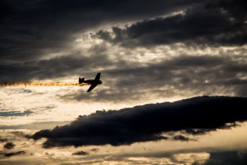 sunset silhouette airplane