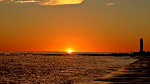 sunset orange breakwater