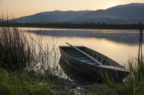 sunset boat reflections