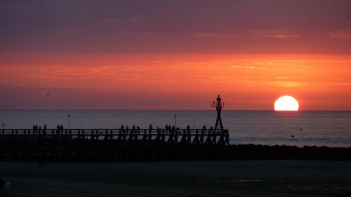 sunset pier sea