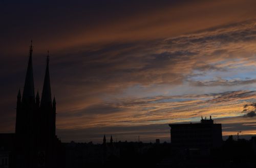 sunset clouds cityscape