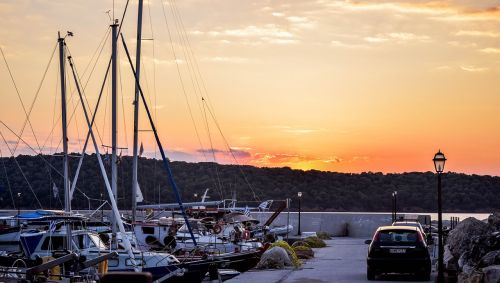 sunset greece boat