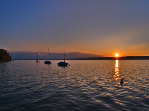 sunset lake boat