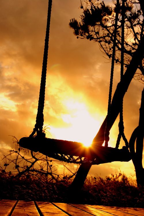 sunset swing clouds