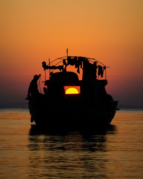 sunset the boat man