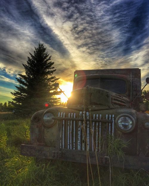 sunset manitoba old truck