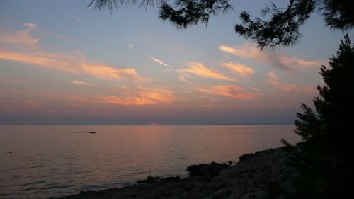 sunset sea fishing boat