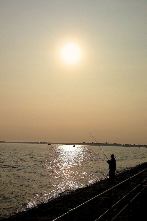 sunset beach fishing