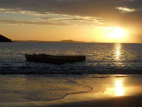 sunset beach boats